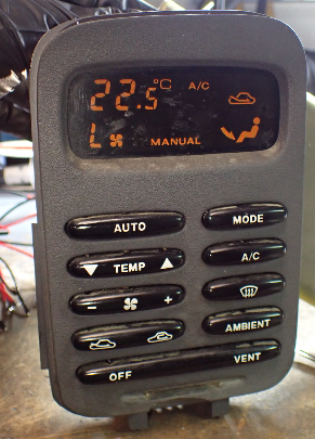 Car air conditioning control panel with digital display and buttons